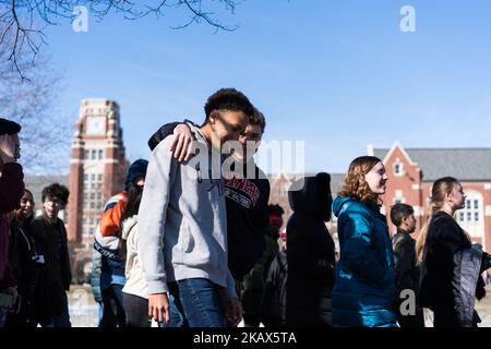 Students at Lane Technical High School in Chicago participate in a walkout to take a stand against school shootings and gun violence on March 14, 2018. Students across the U.S. participated in this 17 minute demonstration one month after the school shooting in Parkland, Florida. (Photo by Max Herman/NurPhoto) Stock Photo