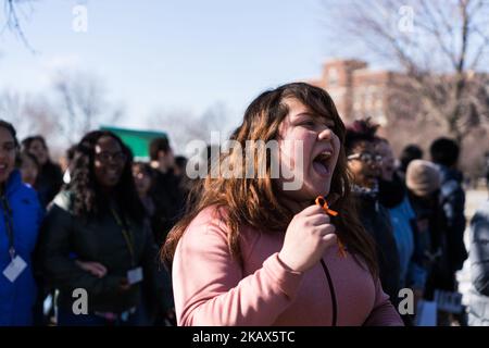 Students at Lane Technical High School in Chicago participate in a walkout to take a stand against school shootings and gun violence on March 14, 2018. Students across the U.S. participated in this 17 minute demonstration one month after the school shooting in Parkland, Florida. (Photo by Max Herman/NurPhoto) Stock Photo