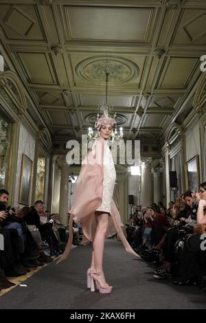 A Model shows a EMILIO SALINAS design during fashion week ATELIER COUTURE fashionable bridal and luxury in ceremony at the Fernan Nunez Palace in Madrid March 15, 2018 (Photo by Oscar Gonzalez/NurPhoto) Stock Photo