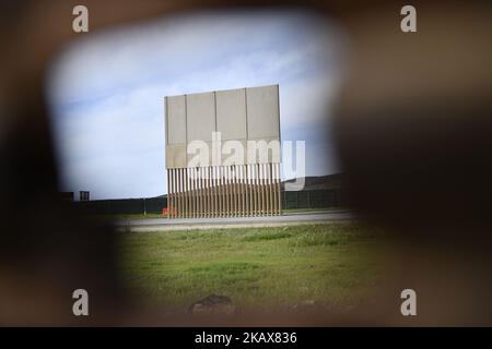 Eight border wall prototypes are on display in Otay Mesa, a community in the southern section of the city of San Diego, just north of the U.S.–Mexico border near the U.S. and Mexico border as seen from Tijuana, Mexico on Sunday, March 18, 2018. President Donald Trump inspected the prototypes on Tuesday, March 13, 2018. (Photo by Yichuan Cao/NurPhoto) Stock Photo