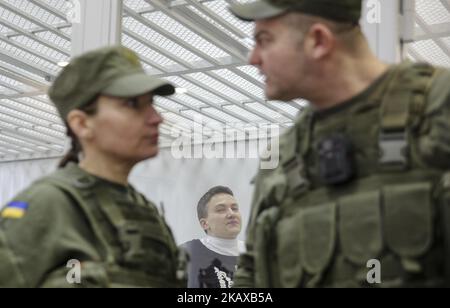 Arrested in accusation of terrorism MP Nadia Savchenko is seen in the court cage during the hearing in Kyiv, Ukraine, March 29, 2018. Appeal Court of Kyiv hears the case on Nadia Savchenko arrest. (Photo by Sergii Kharchenko/NurPhoto) Stock Photo