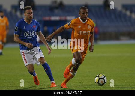 FC Porto Forward Yacine Brahimi from Algeria (R) and CF Os Belenenses Midfielder Hassan Yebda from Algeria (L) during the Premier League 2017/18 match between CF Os Belenenses v FC Porto, at Estadio do Restelo stadium in Lisbon, Portugal on April 2, 2018. (Photo by Bruno Barros / DPI / NurPhoto) Stock Photo