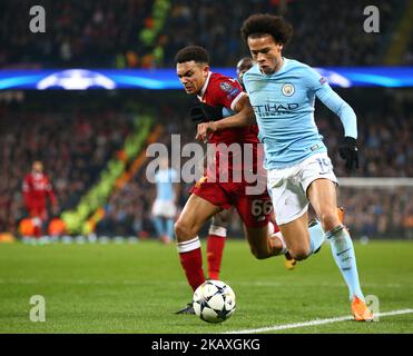 Manchester City's Leroy Sane holds of Liverpool's Trent Alexander-Arnold during the UEFA Champions League Quarter Final Second Leg match between Manchester City and Liverpool at Etihad Stadium on April 10, 2018 in Manchester, England. (Photo by Kieran Galvin/NurPhoto)  Stock Photo