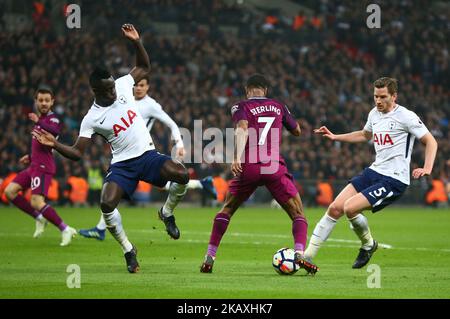 L-R Tottenham Hotspur's Davinson Sanchez, Manchester City's Raheem Sterling and Tottenham Hotspur's Jan Vertonghen during the Premiership League match between Tottenham Hotspur and Manchester City at Wembley Stadium in London, England on April 14, 2018. (Photo by Kieran Galvin/NurPhoto)  Stock Photo