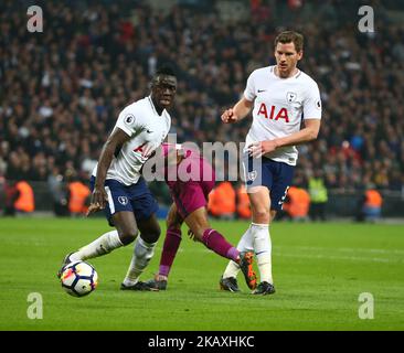 L-R Tottenham Hotspur's Davinson Sanchez, Manchester City's Raheem Sterling and Tottenham Hotspur's Jan Vertonghen during the Premiership League match between Tottenham Hotspur and Manchester City at Wembley Stadium in London, England on April 14, 2018. (Photo by Kieran Galvin/NurPhoto)  Stock Photo