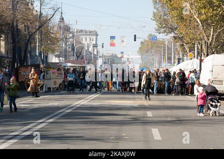 Chisinau, Moldova - October 15, 2022: People walk along Stefan cel Mare Avenue on the City Day holiday. Selective focus. Stock Photo