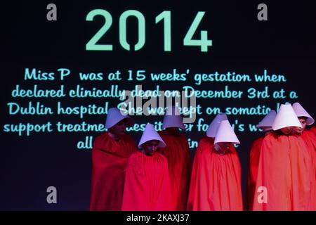 ROSA activists dressed as 'Handmaids' during a Rally for Equality, Freedom & Choice organised by ROSA - an Irish Socialist Feminist Movement at Liberty Hall in Dublin, Ireland on April 14, 2018. (Photo by Artur Widak/NurPhoto) Stock Photo