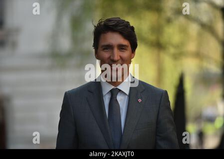 Canadian Prime Minister Justin Trudeau smiles as he arrives Downing Street to meeting British Prime Minister Theresa May for talks on April 18, 2018 in London, England. Mrs May holds bilateral talks with a number of Commonwealth leaders today as the UK this week hosts heads of state and government from the Commonwealth nations. (Photo by Alberto Pezzali/NurPhoto) Stock Photo