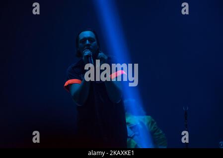 Canadian indie rock band Arcade FIre is pictured on atage as they perform at Arena Wembley, London on April 12, 2018. Arcade Fire is a Canadian indie rock band, consisting of husband and wife Win Butler (vocals, bass, guitar) and Régine Chassagne, along with Win's younger brother William Butler, Richard Reed Parry, Tim Kingsbury and Jeremy Gara. The band's current touring line-up also includes former core member Sarah Neufeld, percussionist Tiwill Duprate and saxophonist Stuart Bogie. (Photo by Alberto Pezzali/NurPhoto) Stock Photo