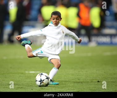 Cristiano Ronaldo Jr, son of Cristiano Ronaldo of Real Madrid, plays with a ball prior the UEFA Champions League, semi final, 2nd leg football match between Real Madrid and Bayern Munich on May 1, 2018 at Santiago Bernabeu stadium in Madrid, Spain (Photo by Raddad Jebarah/NurPhoto) Stock Photo