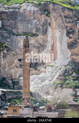 The ancient Silk Road trading post of Hasankeyf, which sits on the banks of Tigris River in southeast Turkey, will soon be flooded by the Ilisu Dam. Picture here, construction crews destroy limestone cliffs dotted with neolithic caves and pulverize a world heritage site to prep the area for submerging later this summer. Photo taken 22 March 2018. (Photo by Diego Cupolo/NurPhoto) Stock Photo