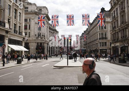 Union Jack flags stretch across Regent Street ahead of the much-anticipated wedding of Britain's Prince Harry to former US actress Meghan Markle, eight days hence, amid a growing sense of occasion in London, England, on May 11, 2018. Sixth-in-line to the throne Harry is to wed Ms Markle in a ceremony at the royal residence of Windsor Castle, on the outskirts of London, on May 19. (Photo by David Cliff/NurPhoto) Stock Photo