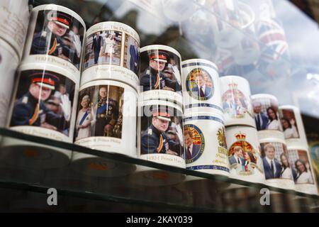 Souvenir mugs of Britain's Prince Harry stand on display in a shop window near Piccadilly Circus ahead of the much-anticipated wedding of Harry to former US actress Meghan Markle, eight days hence, amid a growing sense of occasion in London, England, on May 11, 2018. Sixth-in-line to the throne Harry is to wed Ms Markle in a ceremony at the royal residence of Windsor Castle, on the outskirts of London, on May 19. (Photo by David Cliff/NurPhoto) Stock Photo