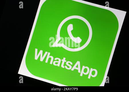 The logo of the messenger app owned by facebook Whatsapp is seen on a screen. (Photo by Alexander Pohl/NurPhoto) Stock Photo