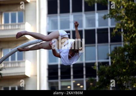 French performer Chloe Moglia delivers a breathtaking acrobatic performance at Syntagma square in Athens, Greece on June 7, 2018 as part of the Athens Epidaurus Festival 2018. (Photo by Giorgos Georgiou/NurPhoto) Stock Photo