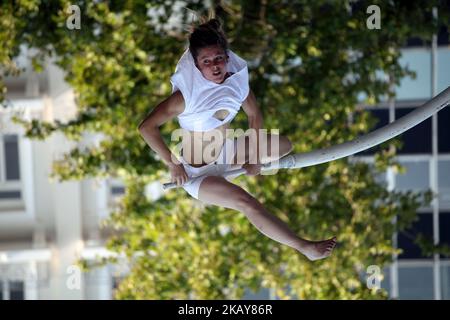 French performer Chloe Moglia delivers a breathtaking acrobatic performance at Syntagma square in Athens, Greece on June 7, 2018 as part of the Athens Epidaurus Festival 2018. (Photo by Giorgos Georgiou/NurPhoto) Stock Photo