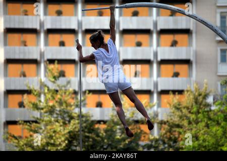 French performer Chloe Moglia delivers a breathtaking acrobatic performance at Syntagma square in Athens, Greece on June 7, 2018 as part of the Athens Epidaurus Festival 2018. (Photo by Giorgos Georgiou/NurPhoto) Stock Photo