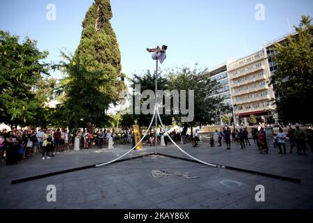 French performer Chloe Moglia delivers a breathtaking acrobatic performance at Syntagma square in Athens, Greece on June 7, 2018 as part of the Athens Epidaurus Festival 2018. (Photo by Giorgos Georgiou/NurPhoto) Stock Photo