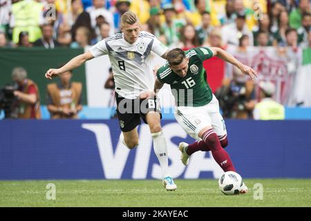 Toni Kroos of Germany and Hector Herrera of Mexico during the 2018 FIFA World Cup Russia Group F match between Germany and Mexico at Luzhniki Stadium in Moscow, Russia on June 17, 2018 (Photo by Andrew Surma/NurPhoto) Stock Photo