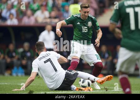 Julian Draxler of Germany and Hector Herrera of Mexico during the 2018 FIFA World Cup Russia Group F match between Germany and Mexico at Luzhniki Stadium in Moscow, Russia on June 17, 2018 (Photo by Andrew Surma/NurPhoto) Stock Photo