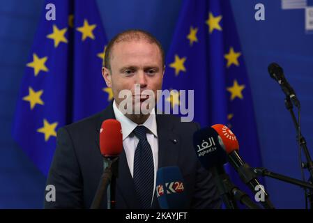 Joseph Muscat, Prime Minister of Malta since 2013, and Leader of the Partit Laburista since June 2008 talking to the press after an informal summit at the EU Commission in Brussels, Belgium on June 24, 2018. The leaders of France and Germany said that they were prepared to side-step anti-migrant EU members and do deals with individual countries on how to respond to a migrant influx that has caused deep splits in the bloc. The talks among 16 of the European Union's 28 leaders began after Italy's new populist government turned away another ship packed with migrants. (Photo by Wassilios Aswestopo Stock Photo