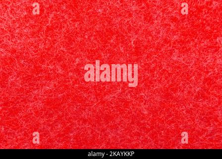 Red or purple fabric with fine white threads. Felt material hot pink Stock Photo