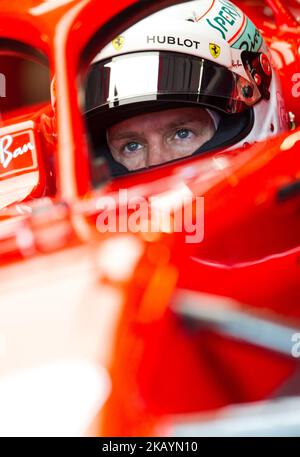 Sebastian Vettel of Germany and Scuderia Ferrari driver before the qualification at Austrian Formula One Grand Prix on Jun 30, 2018 in Red Bull Ring, Spielberg, Austria. (Photo by Robert Szaniszló/NurPhoto) Stock Photo