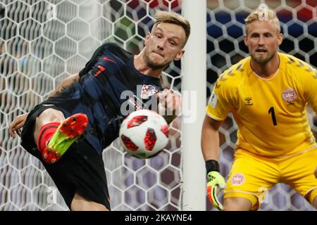 Ivan Rakitic (L) of Croatia national team and Kasper Schmeichel of Denmark national team in action during the 2018 FIFA World Cup Russia Round of 16 match between Croatia and Denmark on July 1, 2018 at Nizhny Novgorod Stadium in Nizhny Novgorod, Russia. (Photo by Mike Kireev/NurPhoto) Stock Photo