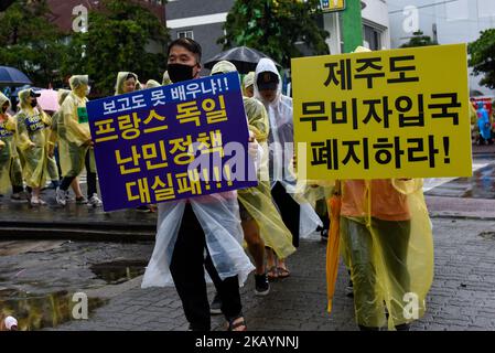 More than 100 Jeju citizens are protesting against the acceptance of Yemen refugees in front of Jeju City Hall on June 30, 2018 in Jeju Island, South Korea. (Photo by Chris Jung/NurPhoto) Stock Photo
