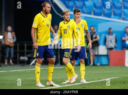(L to R) Andreas Granqvist, Emil Forsberg and Victor Lindelof of Sweden national team during the 2018 FIFA World Cup Russia Round of 16 match between Sweden and Switzerland on July 3, 2018 at Saint Petersburg Stadium in Saint Petersburg, Russia. (Photo by Mike Kireev/NurPhoto) Stock Photo