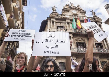 Protest against animal cruelty in bull fightings before San Fermin celebrations in Pamplona, Spain. Banner says 'stop bullfightings'. (Photo by Celestino Arce/NurPhoto) Stock Photo