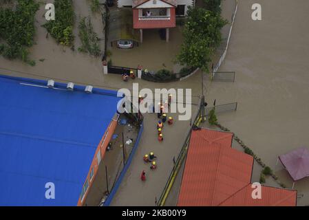 Nepalese army and police personnel rescue team searching people in a flooded area at Thimi, Bhaktapur, Nepal on Thursday, July 12, 2018. Normal life across the country including Kathmandu Valley has been affected due to incessant rainfall since Wednesday Evening. (Photo by Narayan Maharjan/NurPhoto) Stock Photo