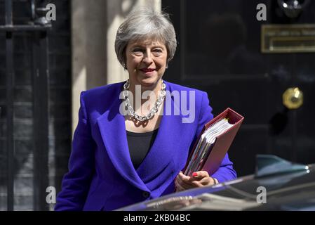 British Prime Minister Theresa May leaves 10 Downing Street as she makes her way to the Parliament to attend Prime Minister Questions session (PMQs), London on July 18, 2018. Theresa May will address Conservative MPs later amid bitter divisions in their ranks over her Brexit policy. The meeting will be the prime minister's last chance to rally backbenchers before the summer recess. (Photo by Alberto Pezzali/NurPhoto) Stock Photo