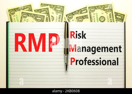 RMP risk management professional symbol. Concept words RMP risk management professional on white note on a beautiful white background. Business RMP ri Stock Photo