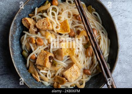 Chinese rice noodle soup called luo si rice noodles, specialty of Liuzhou, Guangxi. The dish consists of rice noodles boiled and served in a soup. Stock Photo