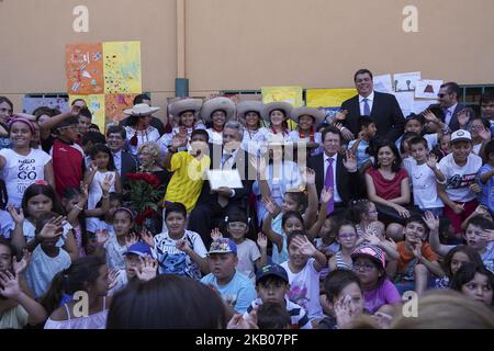 President of the Republic of Ecuador Lenin Moreno and his wife RocÃo Gonzalez visit the Republica de Venezuela school in Madrid. (Photo by Oscar Gonzalez/NurPhoto) Stock Photo