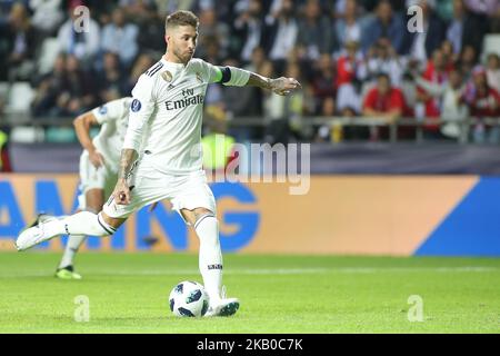 Real Madrid's Spanish defender Sergio Ramos (R) scores the 2-1 from the penalty spot against Atletico Madrid's Slovenian goalkeeper Jan Oblak (not in picture) during the UEFA Super Cup football match Atletico de Madrid vs Real Madrid CF at the Lillekula Stadium in Tallinn, Estonia, on August 15, 2018. (Photo by Ahmad Mora/NurPhoto) Stock Photo