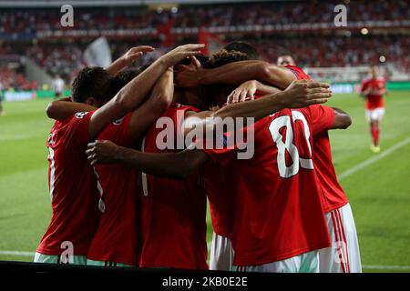 Benfica's Portuguese midfielder Pizzi celebrates with teammates after scoring during the UEFA Champions League play-off first leg match SL Benfica vs PAOK FC at the Luz Stadium in Lisbon, Portugal on August 21, 2018. (Photo by Pedro FiÃºza/NurPhoto) Stock Photo