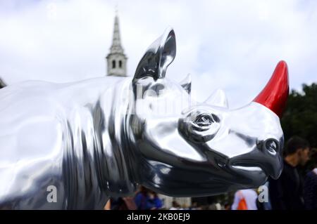 A 300kg rhino sculpture painted by Gerry McGovern is pictured in London on August 22, 2018. The sculpture hits the streets as part of the Tusk Rhino Trail in London, a City-wide installation to raise funds for the protection of rhinos in Africa. (Photo by Alberto Pezzali/NurPhoto) Stock Photo