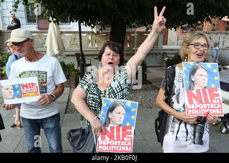 Protesters with Lyudmila Kozlovska pictures are seen in Gdansk, Poland on 23 August 2018 People protest against deportation from Poland an Ukrainian Open Dialogue activist Lyudmila Kozlovska (Ludmila Kozlowska) deported after criticizing right-wing Law And Justice government. Kozlovska lived in Poland with her Polish husband for 10 years. (Photo by Michal Fludra/NurPhoto) Stock Photo
