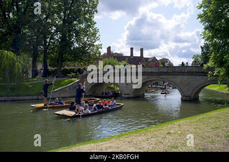 Boats on the river Cam are pictured in Cambridge, on August 25, 2018. Cambridge is home to the world-renowned University of Cambridge, which was founded in 1209. The university includes King's College Chapel, Cavendish Laboratory, and the Cambridge University Library, one of the largest legal deposit libraries in the world. The city's skyline is dominated by several college buildings, along with the spire of the Our Lady and the English Martyrs Church, the chimney of Addenbrooke's Hospital and St John's College Chapel tower. Anglia Ruskin University, evolved from the Cambridge School of Art an Stock Photo