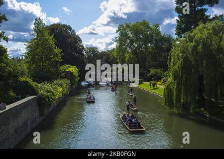 Boats on the river Cam are pictured in Cambridge, on August 25, 2018. Cambridge is home to the world-renowned University of Cambridge, which was founded in 1209. The university includes King's College Chapel, Cavendish Laboratory, and the Cambridge University Library, one of the largest legal deposit libraries in the world. The city's skyline is dominated by several college buildings, along with the spire of the Our Lady and the English Martyrs Church, the chimney of Addenbrooke's Hospital and St John's College Chapel tower. Anglia Ruskin University, evolved from the Cambridge School of Art an Stock Photo