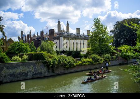 Boats on the river Cam are pictured in Cambridge, on August 25, 2018. Cambridge is home to the world-renowned University of Cambridge, which was founded in 1209. The university includes King's College Chapel, Cavendish Laboratory, and the Cambridge University Library, one of the largest legal deposit libraries in the world. The city's skyline is dominated by several college buildings, along with the spire of the Our Lady and the English Martyrs Church, the chimney of Addenbrooke's Hospital and St John's College Chapel tower. Anglia Ruskin University, evolved from the Cambridge School of Art an Stock Photo