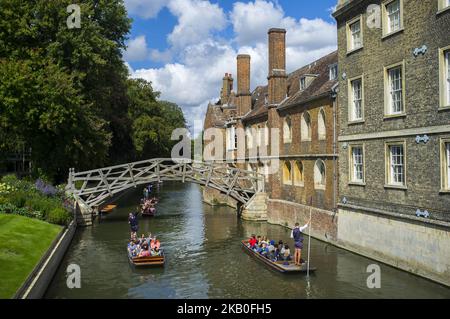 Boats on the river Cam are pictured in Cambridge, on August 25, 2018. Cambridge is home to the world-renowned University of Cambridge, which was founded in 1209. The university includes King's College Chapel, Cavendish Laboratory, and the Cambridge University Library, one of the largest legal deposit libraries in the world. The city's skyline is dominated by several college buildings, along with the spire of the Our Lady and the English Martyrs Church, the chimney of Addenbrooke's Hospital and St John's College Chapel tower. Anglia Ruskin University, evolved from the Cambridge School of Art an Stock Photo