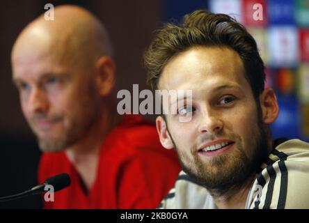 Ajax head coach Erik ten Hag (L) and Ajax's player Daley Blind (R) attend a press conference in Kiev, Ukraine, 27 August,2018. Ajax Amsterdam will play against FC Dynamo Kyiv at the UEFA Champions League play off, second leg, soccer match on August 28. (Photo by STR/NurPhoto) Stock Photo