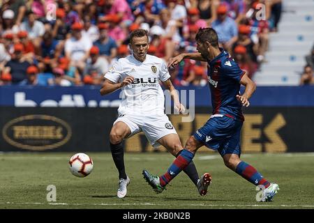 Jorge Andujar Moreno Coke (R) of Levante UD competes for the ball with Denis Cheryshev of Valencia CF during the La Liga match between Levante UD and Valencia CF at Ciutat de Valencia on September 2, 2018 in Valencia, Spain (Photo by David Aliaga/NurPhoto) Stock Photo