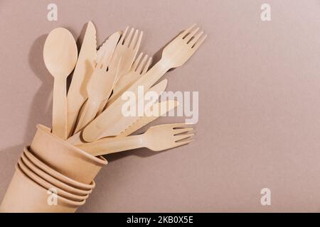 Eco-friendly disposable utensils made of bamboo wood and paper Stock Photo