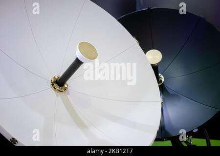 White satellite dish antenna, VSAT parabolic receiver Stock Photo
