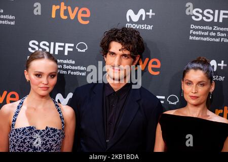 (L-R) Lily-Rose Depp, Louis Garrel and Laetitia Casta attends the 'L'Homme Fidele' (A Faithful Man) premiere during the 66th San Sebastian Film Festival in San Sebastian at Kursaal, San Sebastian on September 22, 2018 in San Sebastian, Spain. (Photo by Manuel Romano/NurPhoto) Stock Photo