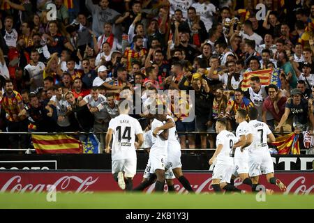 Ezequiel Garay celebrates after scoring his sides first goal during the week 8 of La Liga match between Valencia CF and FC Barcelona at Mestalla Stadium in Valencia, Spain on October 7, 2018. (Photo by Jose Breton/NurPhoto) Stock Photo